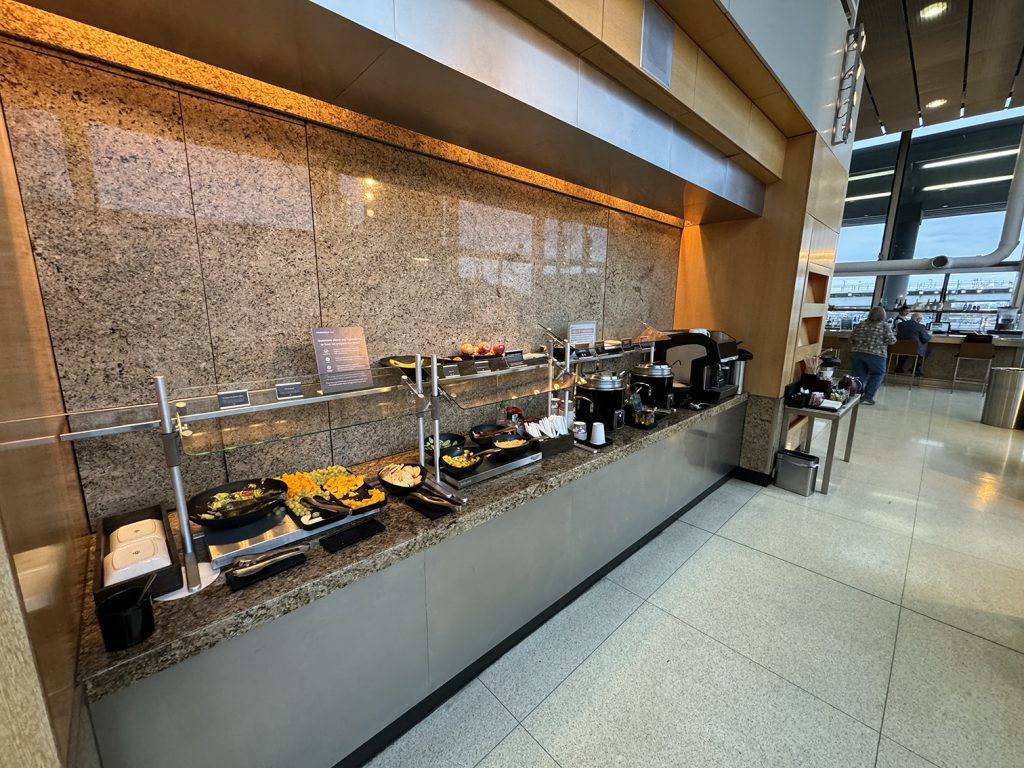 Hot food at the Concourse L Admirals Club in Chicago