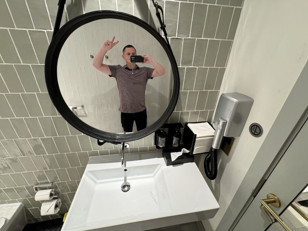 Sink with hair dryer at the Qantas Lounge