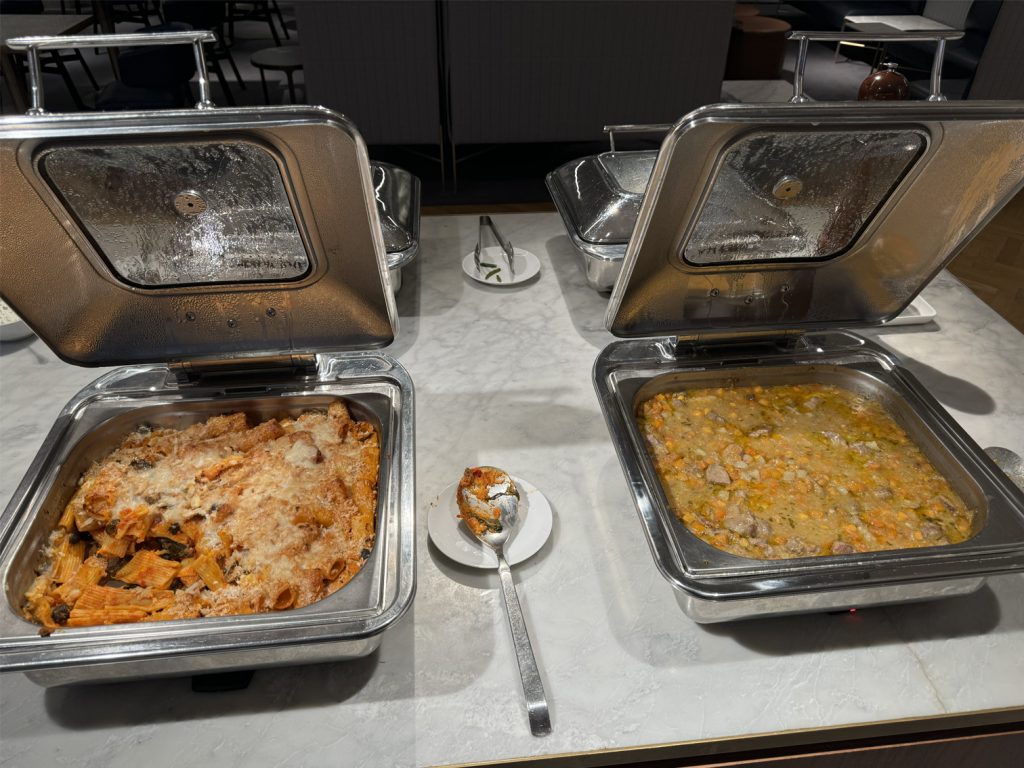 Warm stew and pasta in the Qantas Lounge in London