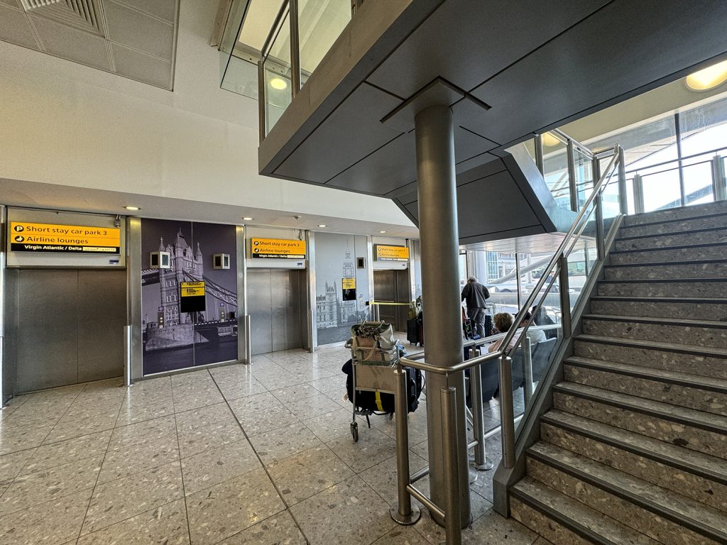 Stairs and elevator to the Virgin Atlantic Revivals Lounge