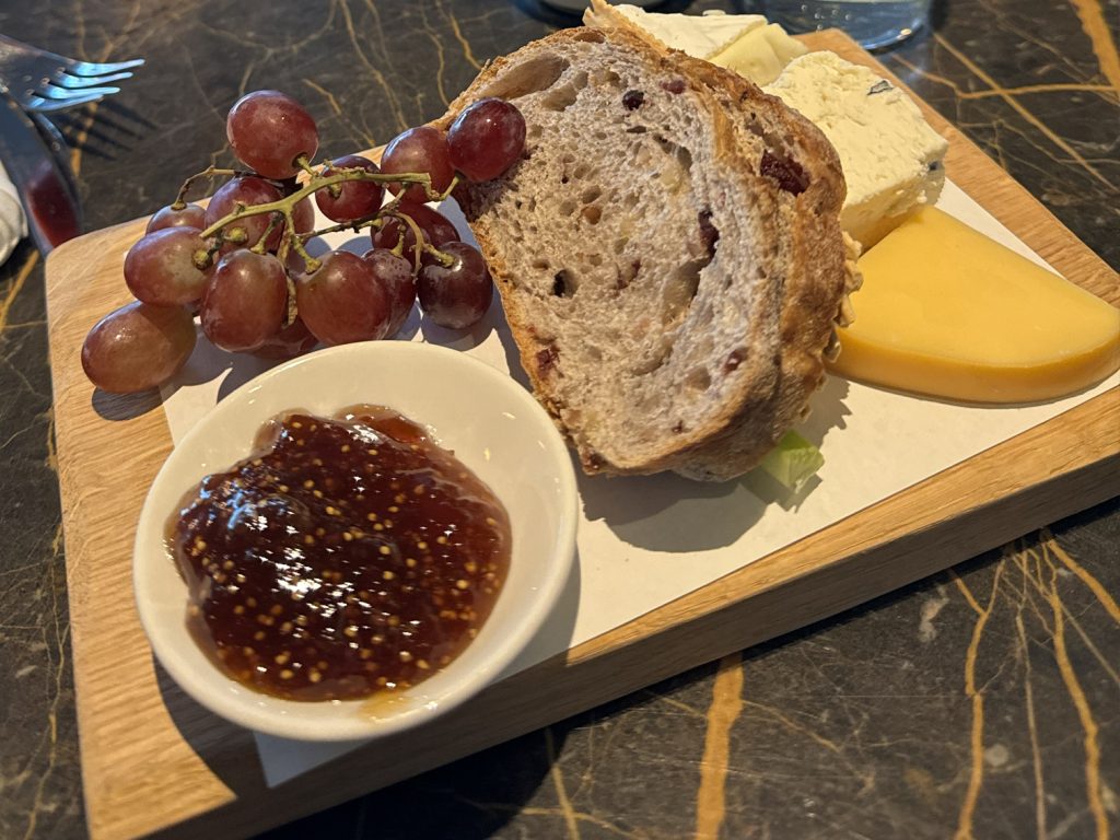 Cheese and fruit plate in the Virgin Atlantic Clubhouse