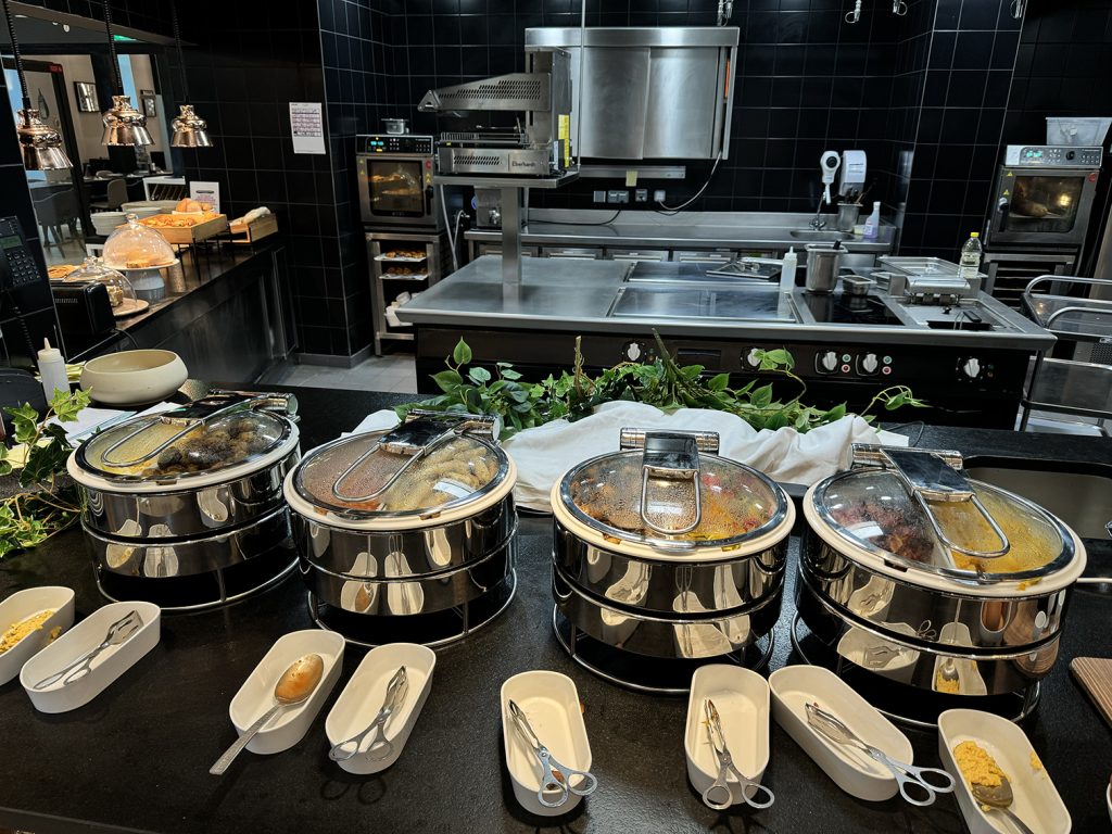 Hot foods at the breakfast buffet at Hilton Garden Inn Paris La Villette